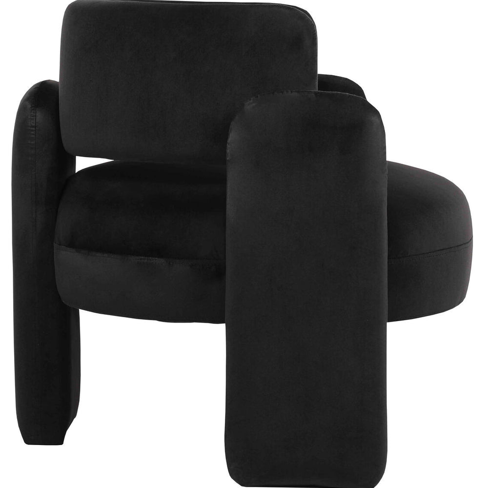 Curved black velvet chair featuring a plush seat and backrest, with rounded armrests that enhance comfort.