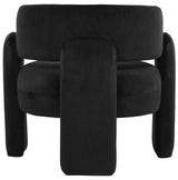 Curved black velvet chair featuring a plush, rounded backrest and thick, padded armrests.