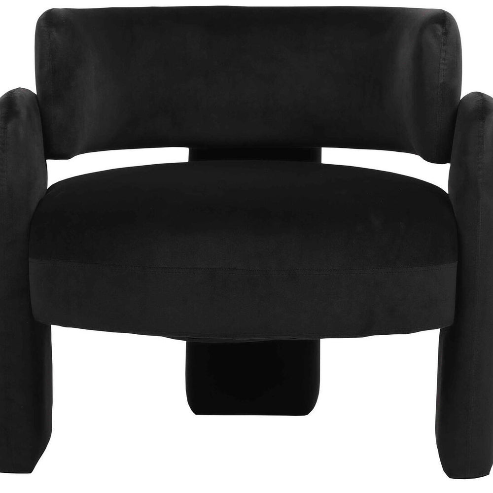 Curved black velvet chair featuring plush upholstery, rounded armrests, and a sturdy base.