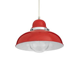 Red metal pendant light with dome shade and white interior, hanging from ceiling