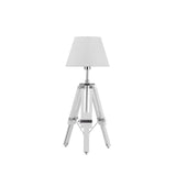 White tripod table lamp with chrome accents and cone-shaped shade on white background