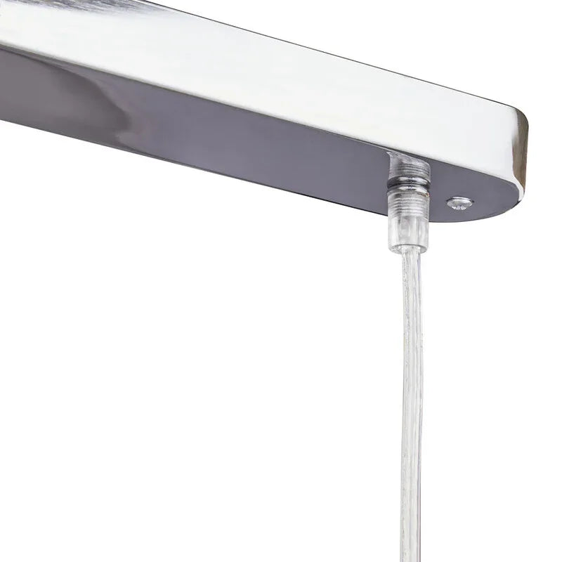 Chrome ceiling light fitting with clear suspension cable and minimalist design, closeup view