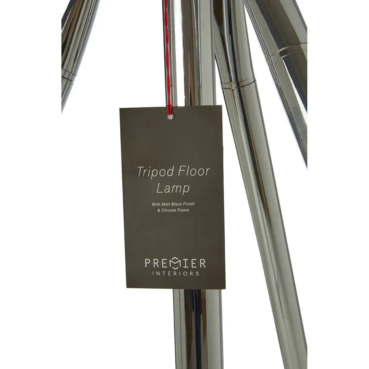 Chrome tripod floor lamp legs with hanging Premier Interiors label