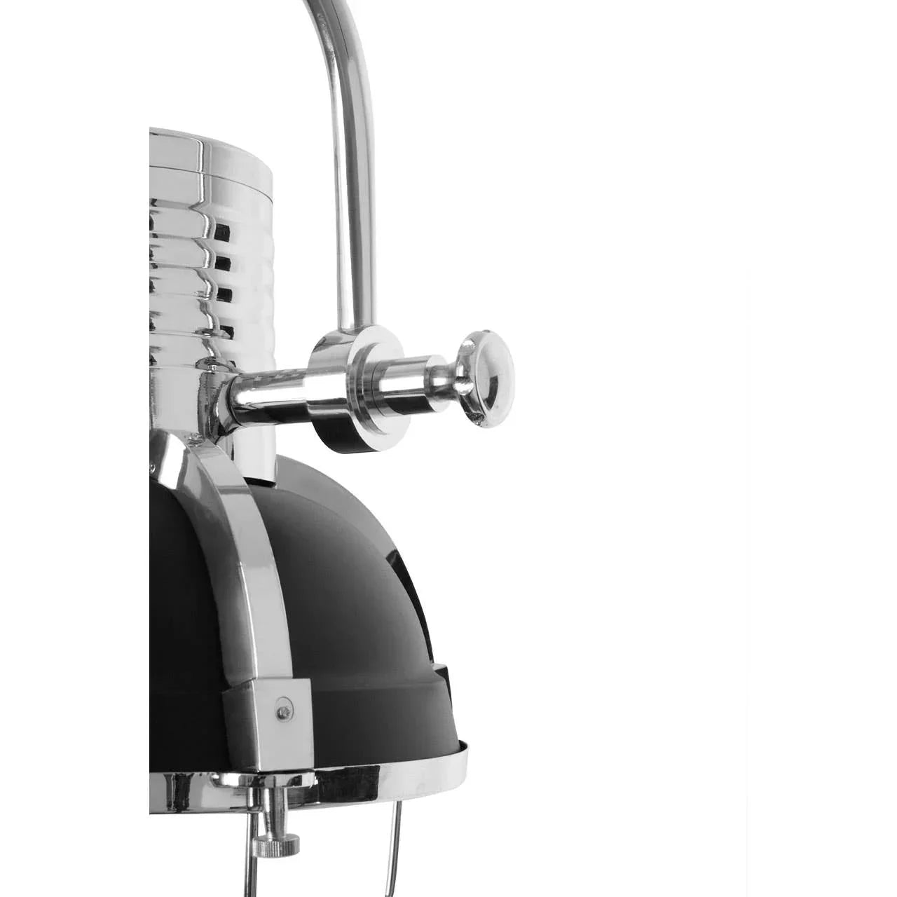 Close-up of black and chrome industrial pendant light with metal fixtures