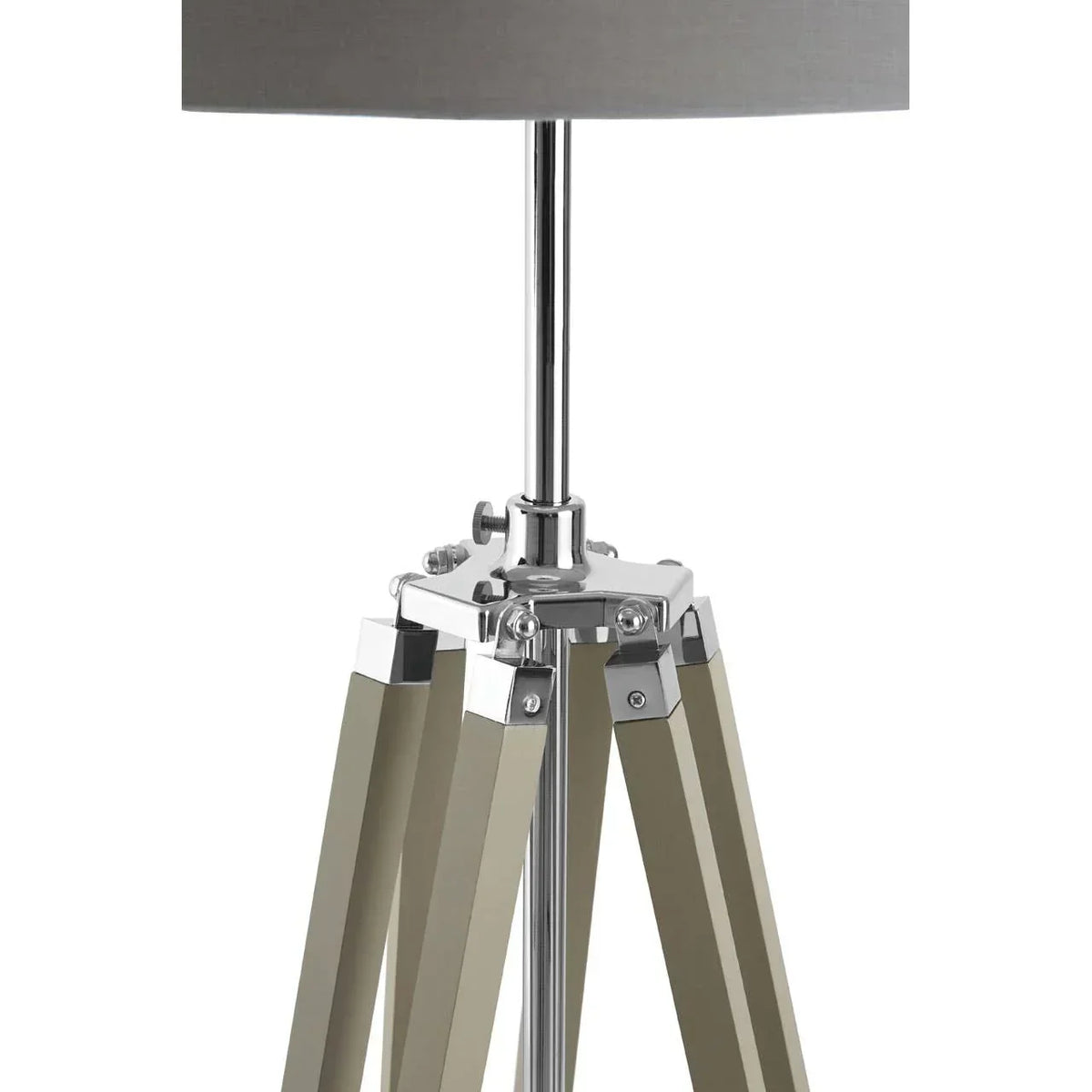 Tripod floor lamp with chrome and wood legs and grey fabric shade close-up
