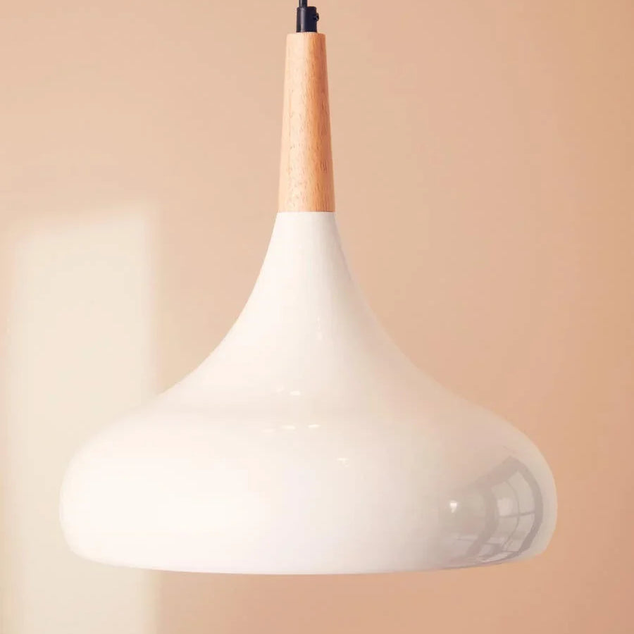 White pendant ceiling light with wooden top against neutral wall