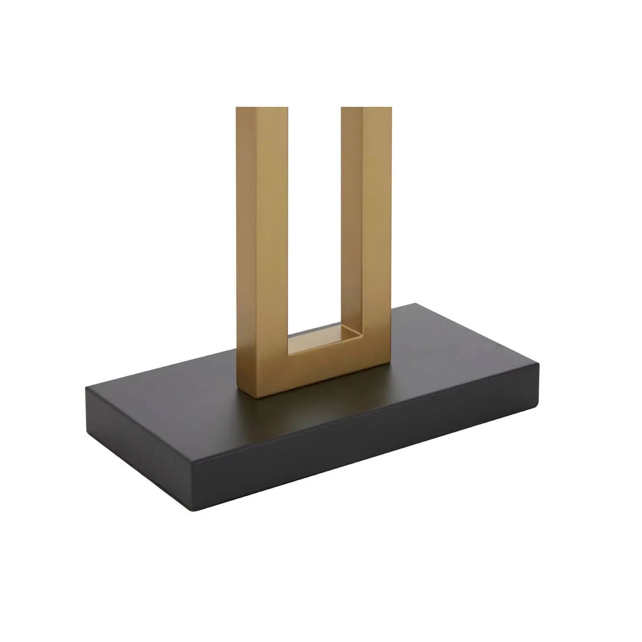 Modern gold metal ornament with rectangular open frame on black base