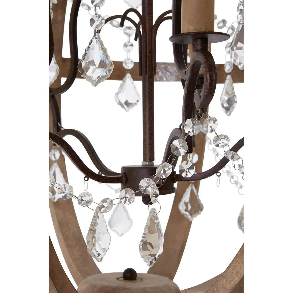 Closeup of crystal chandelier detailing with hanging glass pendants and metal arms