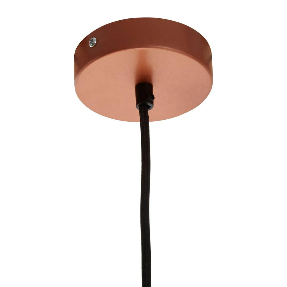 Copper ceiling rose with black pendant light cable and screw fitting, close-up view