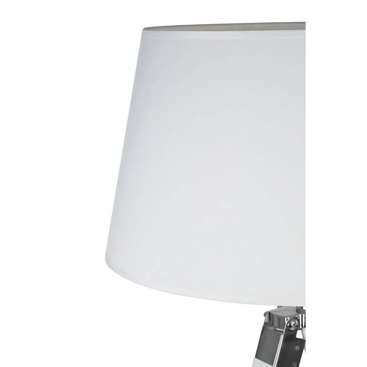 White fabric lamp shade with chrome lamp base, close-up side view