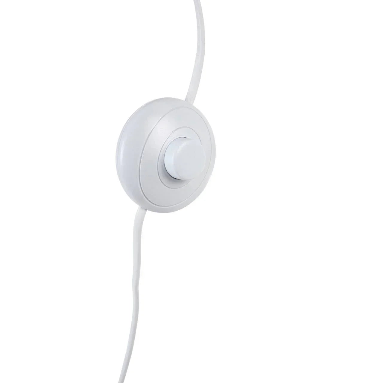 White floor lamp foot switch with round button on white cable against plain background