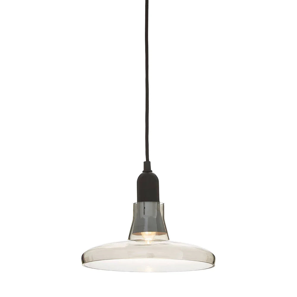 Clear glass pendant light with black fitting and exposed bulb on white background