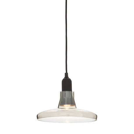 Clear glass pendant light with black fitting and exposed bulb on white background