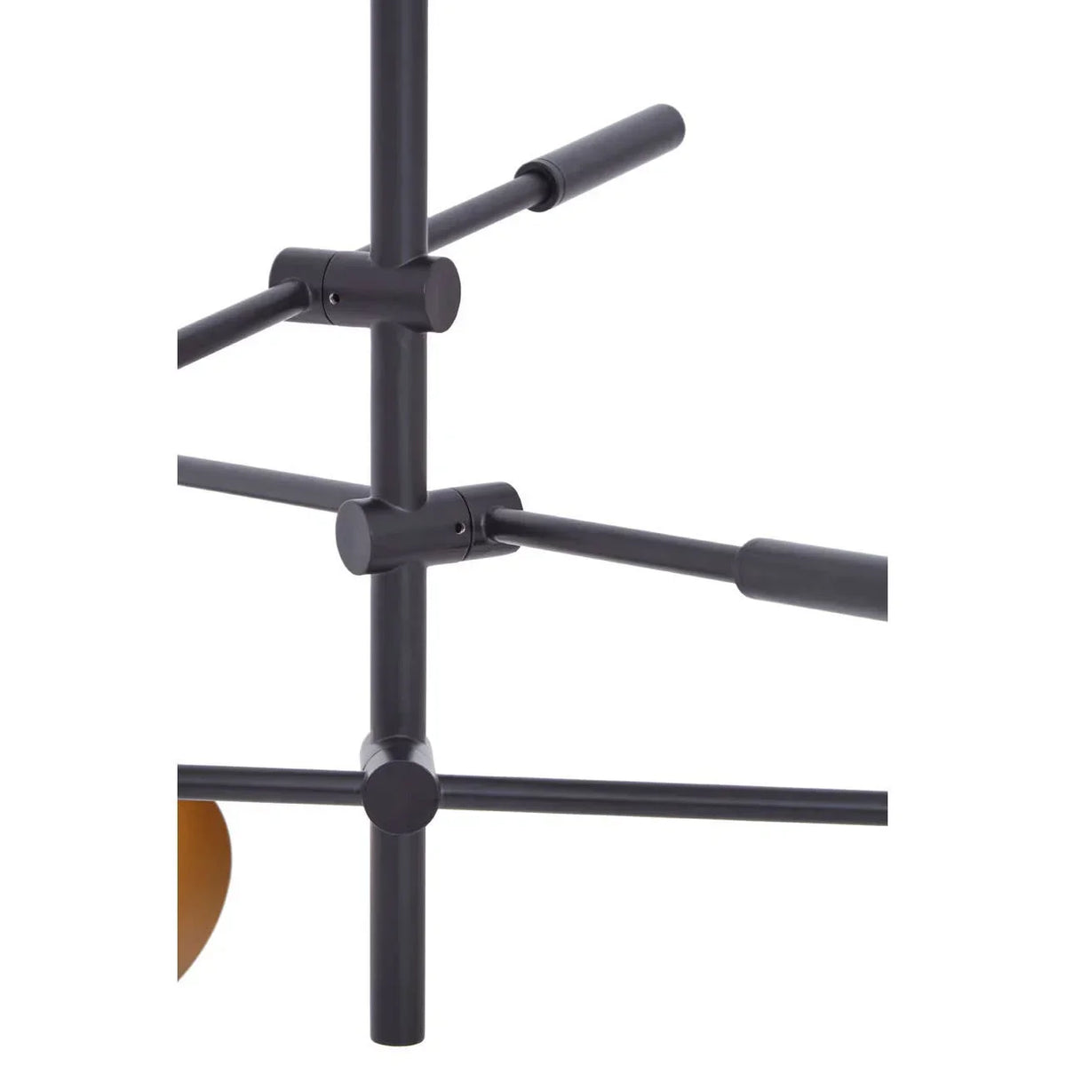 Black metal frame detail of modern furniture with intersecting rods and smooth finish