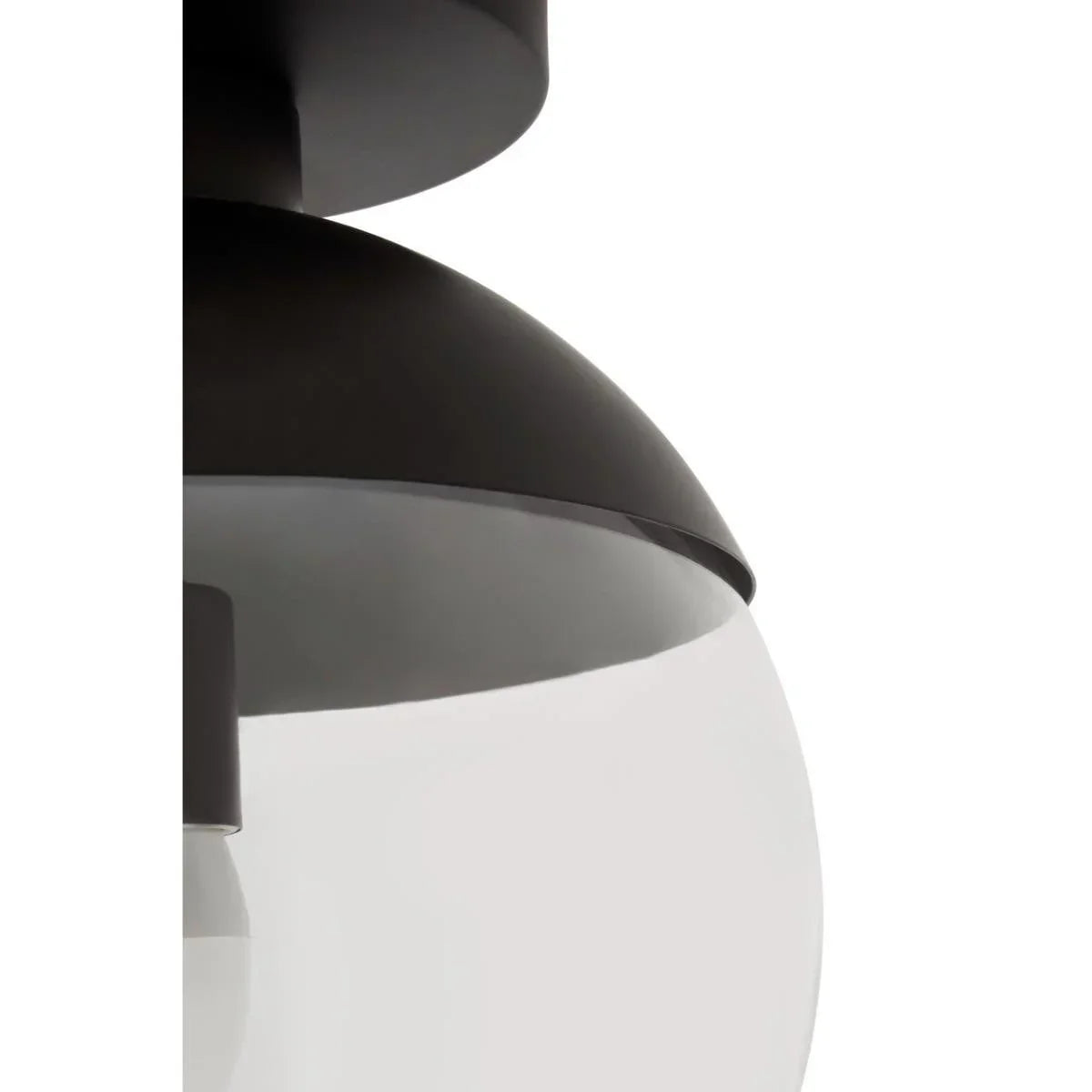 Close up of black metal and clear glass light fixture shade
