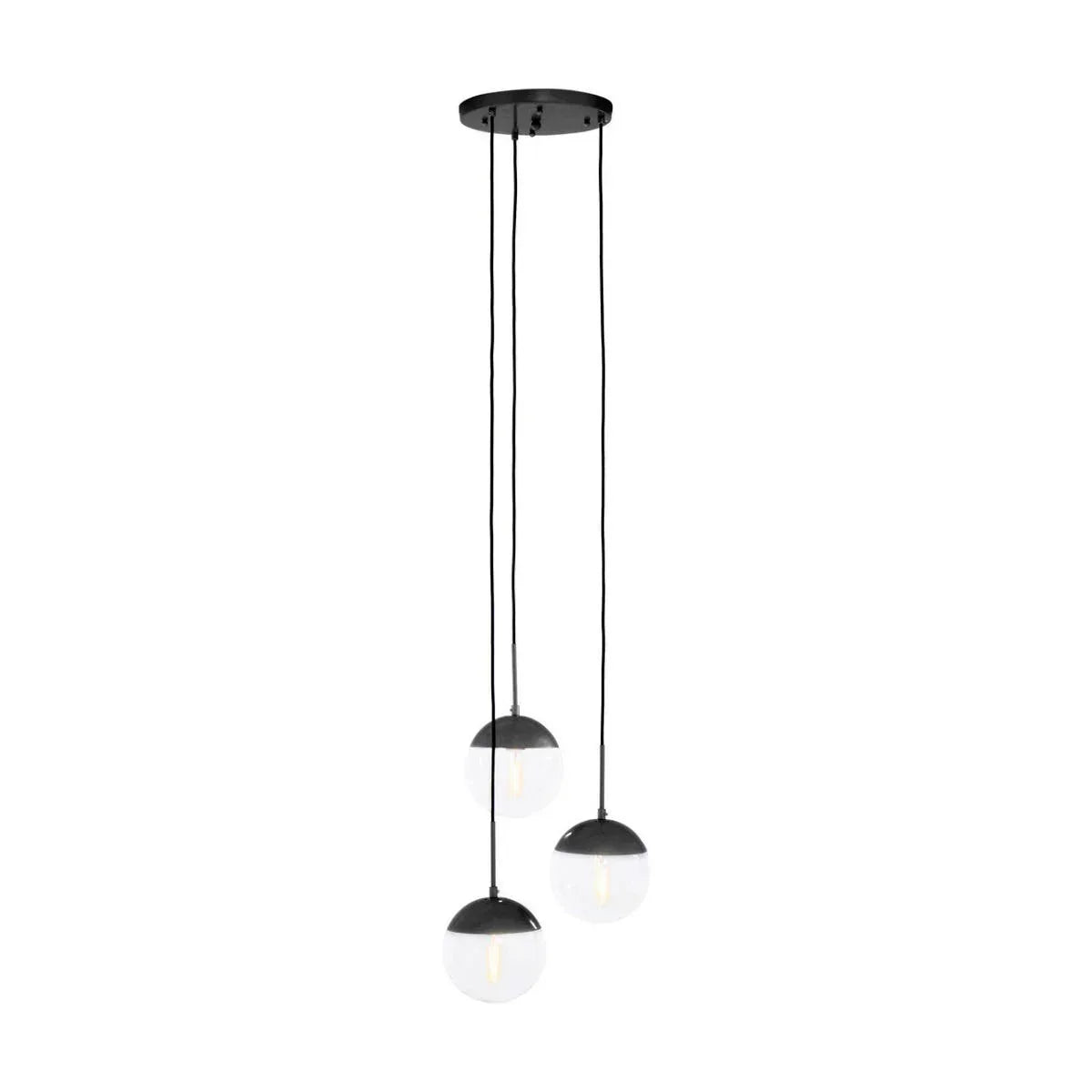 Black and white pendant ceiling light with three glass globe shades hanging in a cluster