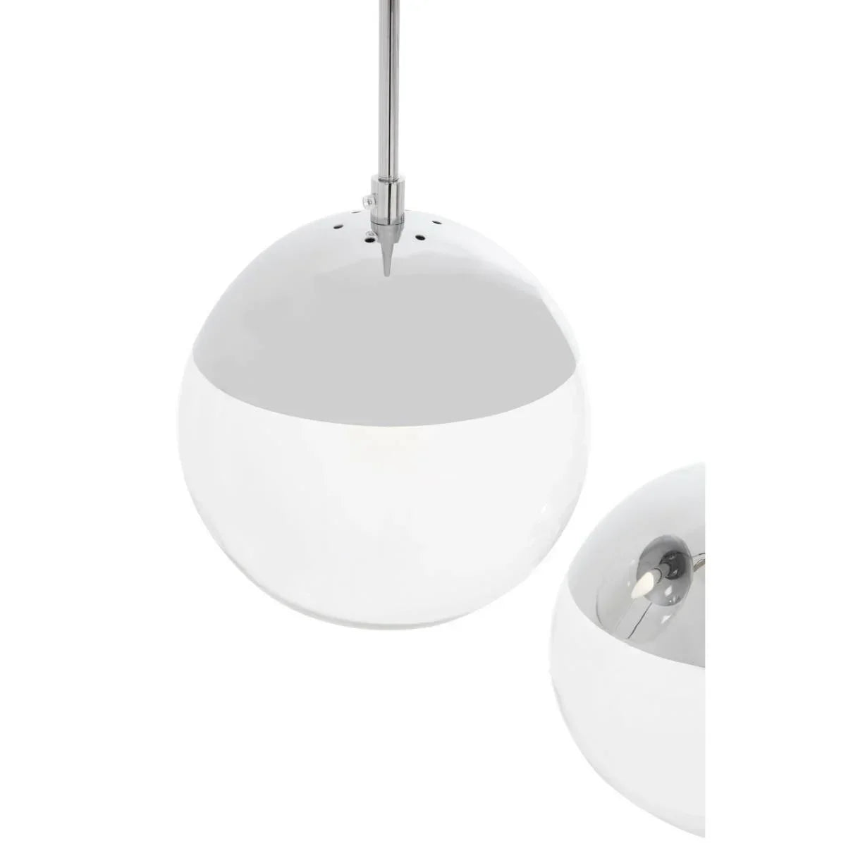 White globe pendant light with chrome fitting and partial view of reflective interior