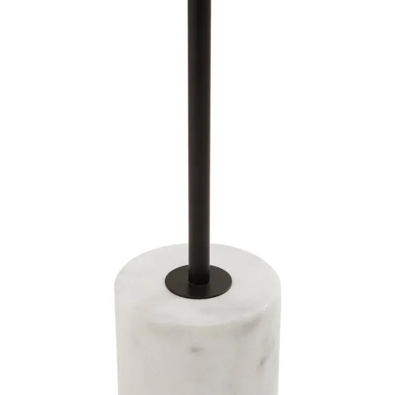 Modern floor lamp with black pole and round white marble base
