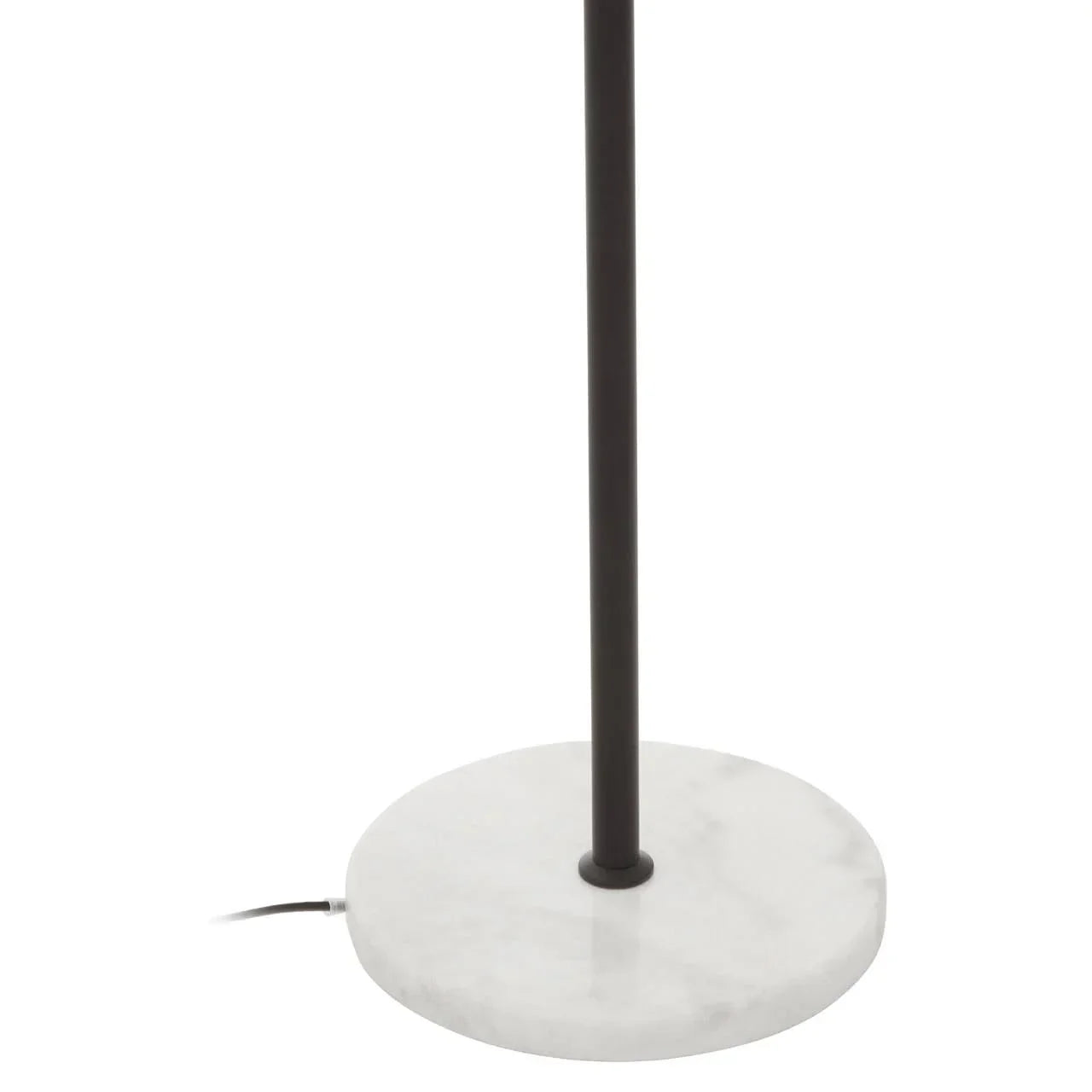 Floor lamp with black metal pole and round white marble base
