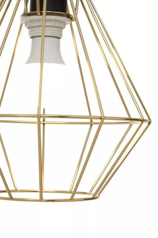 Gold metal pendant light with geometric open frame and exposed bulb holder, close-up view
