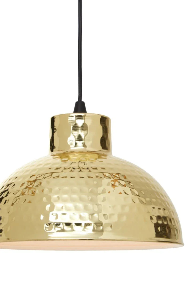 Hammered gold pendant light shade with black cord, close-up front view