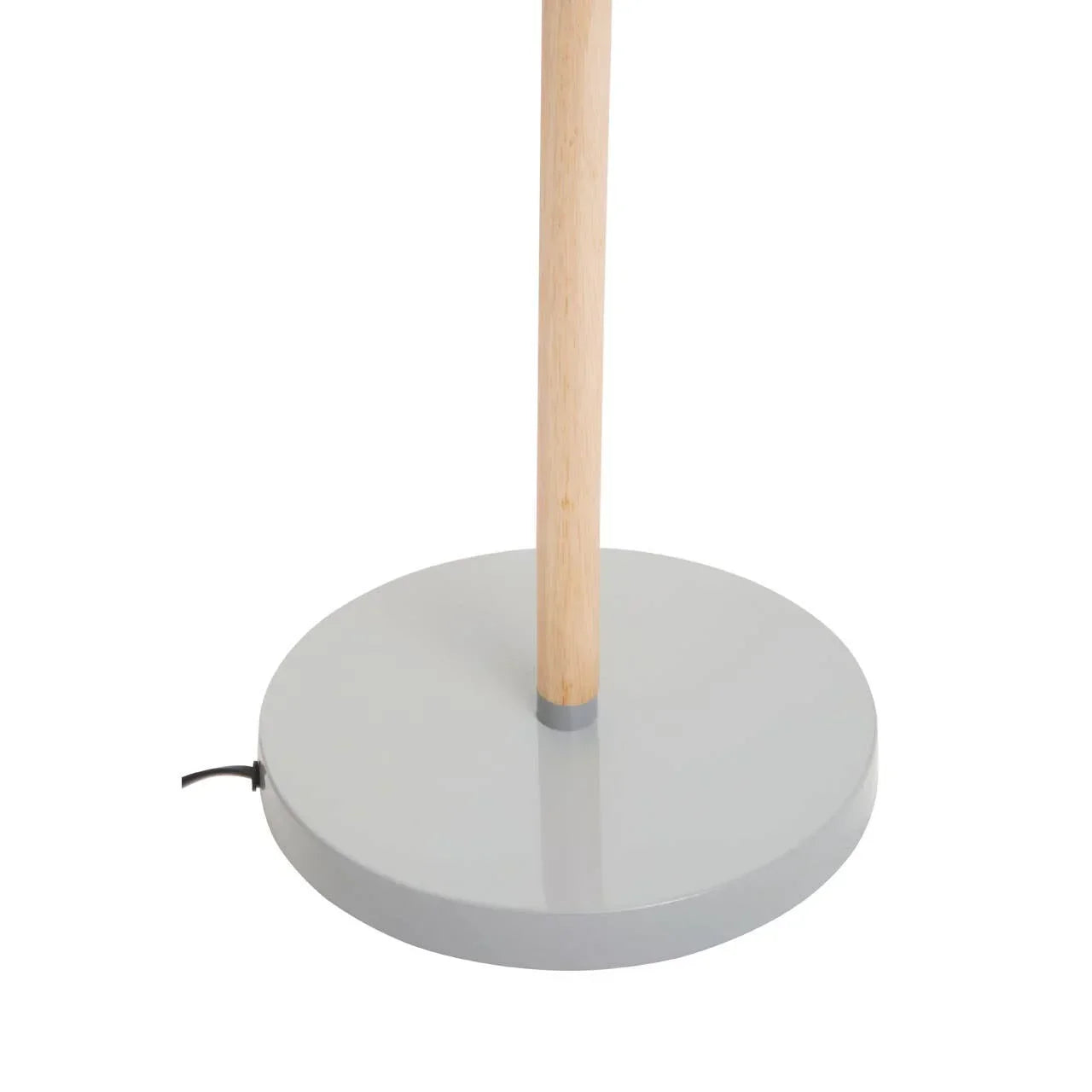 Grey metal lamp base with natural wood stand and visible black power cord