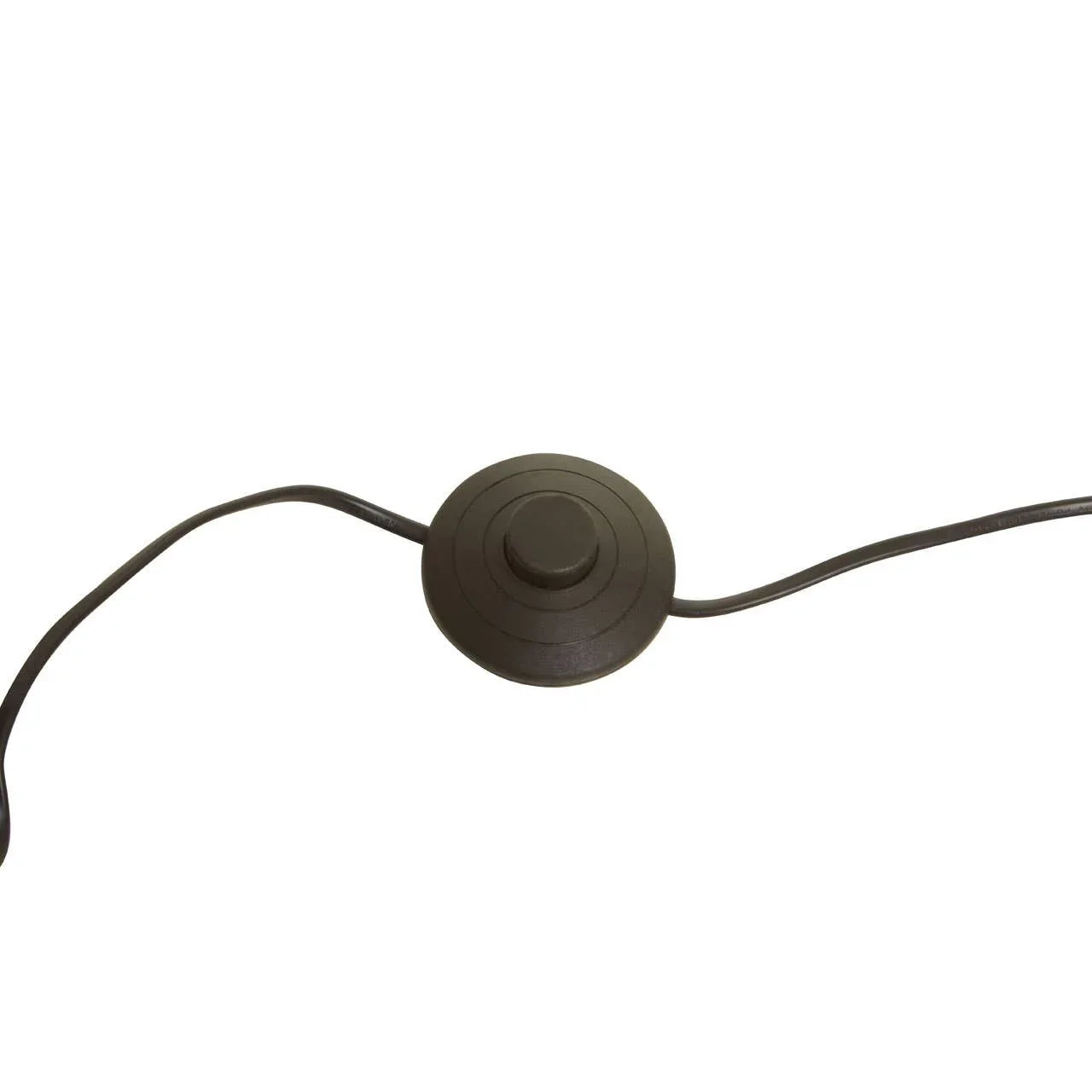 Black floor lamp foot switch with round button and attached power cord on white background