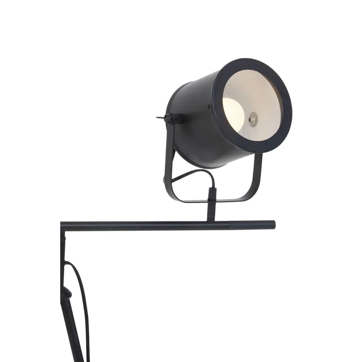Black metal floor lamp with adjustable spotlight head and minimalist frame