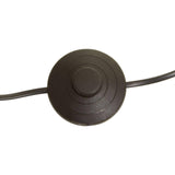Black foot switch for floor lamp with attached power cable, top view