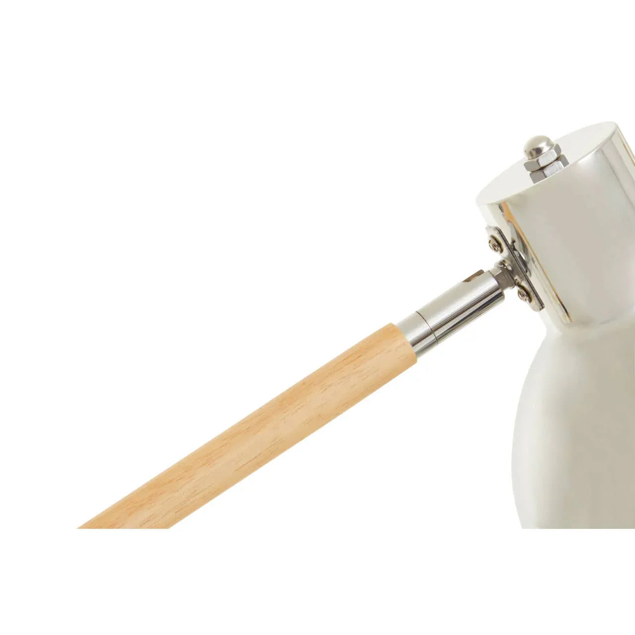 Closeup of table lamp head with chrome fitting and wooden adjustable arm