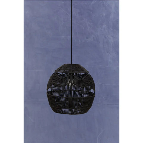 Black rattan pendant light with woven pattern against a blue wall