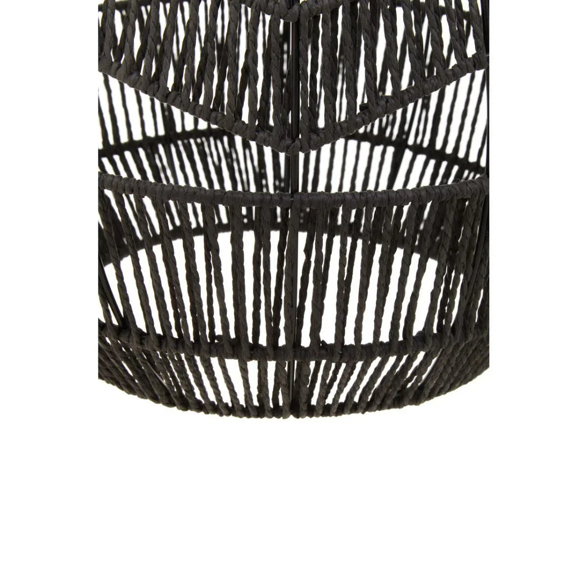 Closeup of black woven rattan furniture base with circular open-weave design