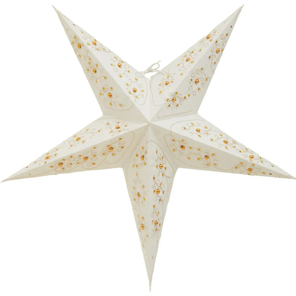 White paper star lantern with gold floral pattern and cut-out details