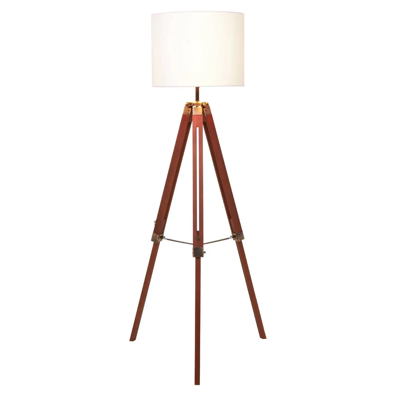Tripod floor lamp with wooden legs and white drum lampshade on white background