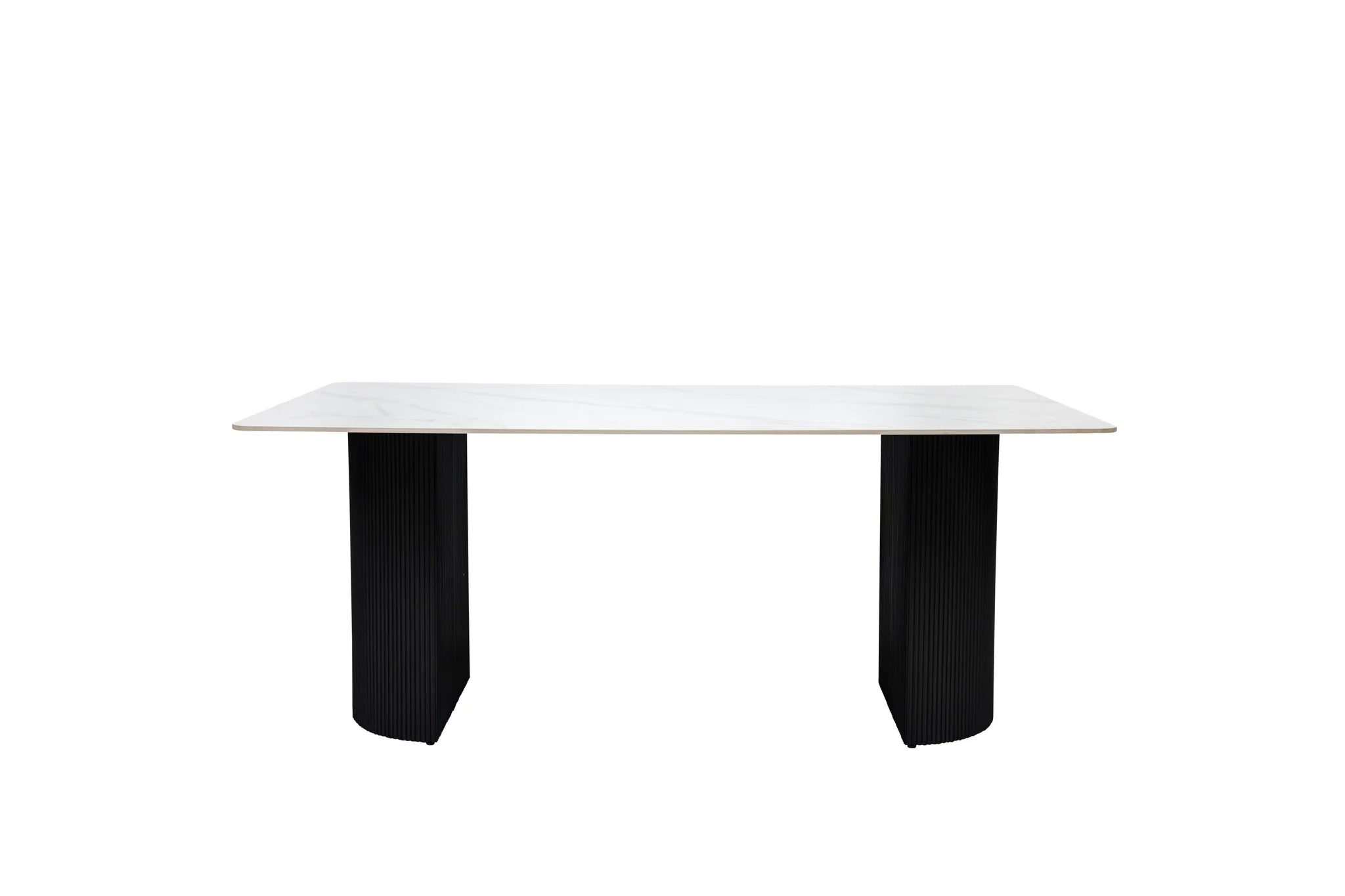 A modern rectangular dining table with a white top and two black ribbed pedestal legs, shown against a plain white background.