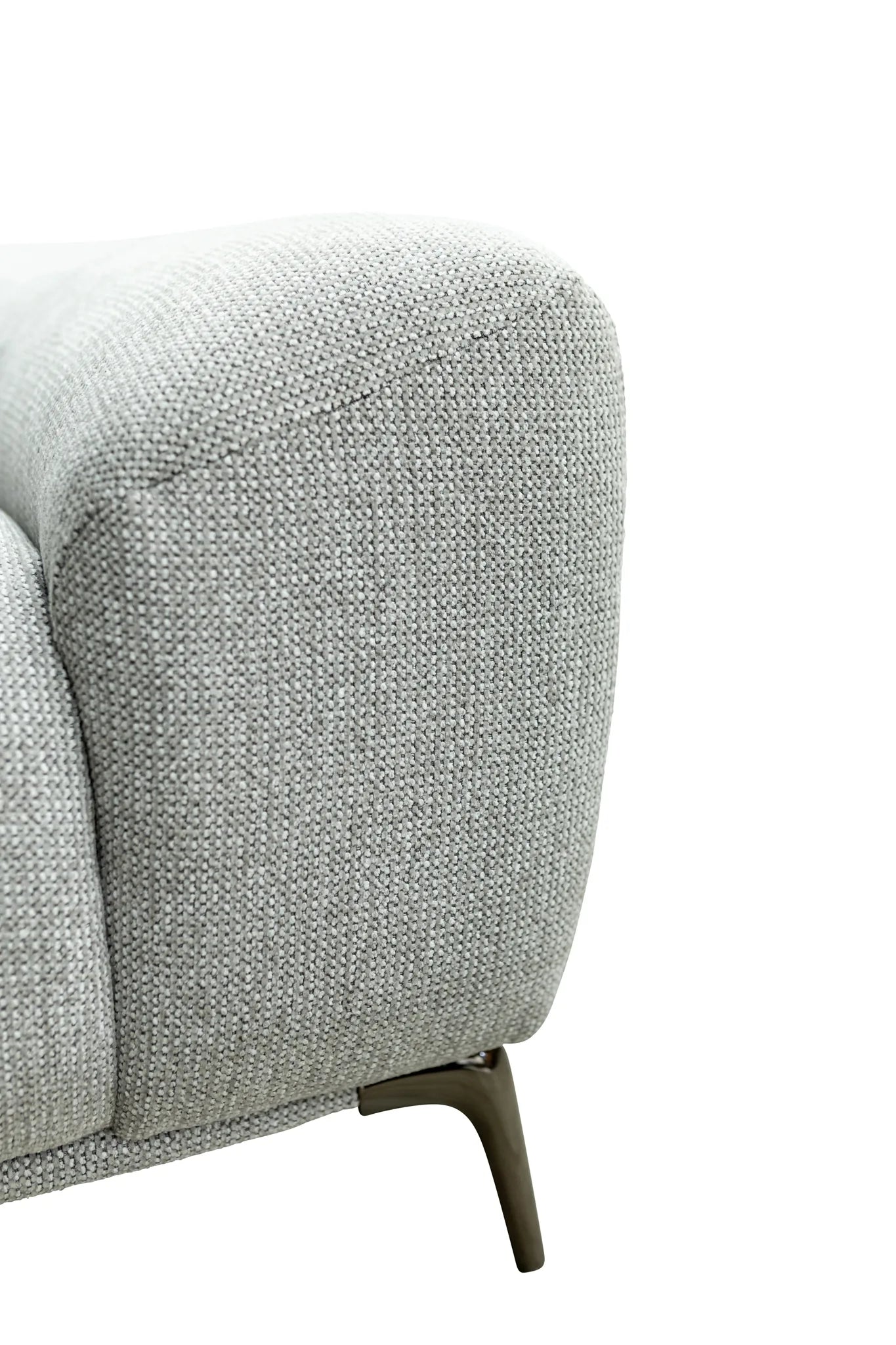 Close-up of a light gray textured fabric armrest with a dark metal leg on a white background.