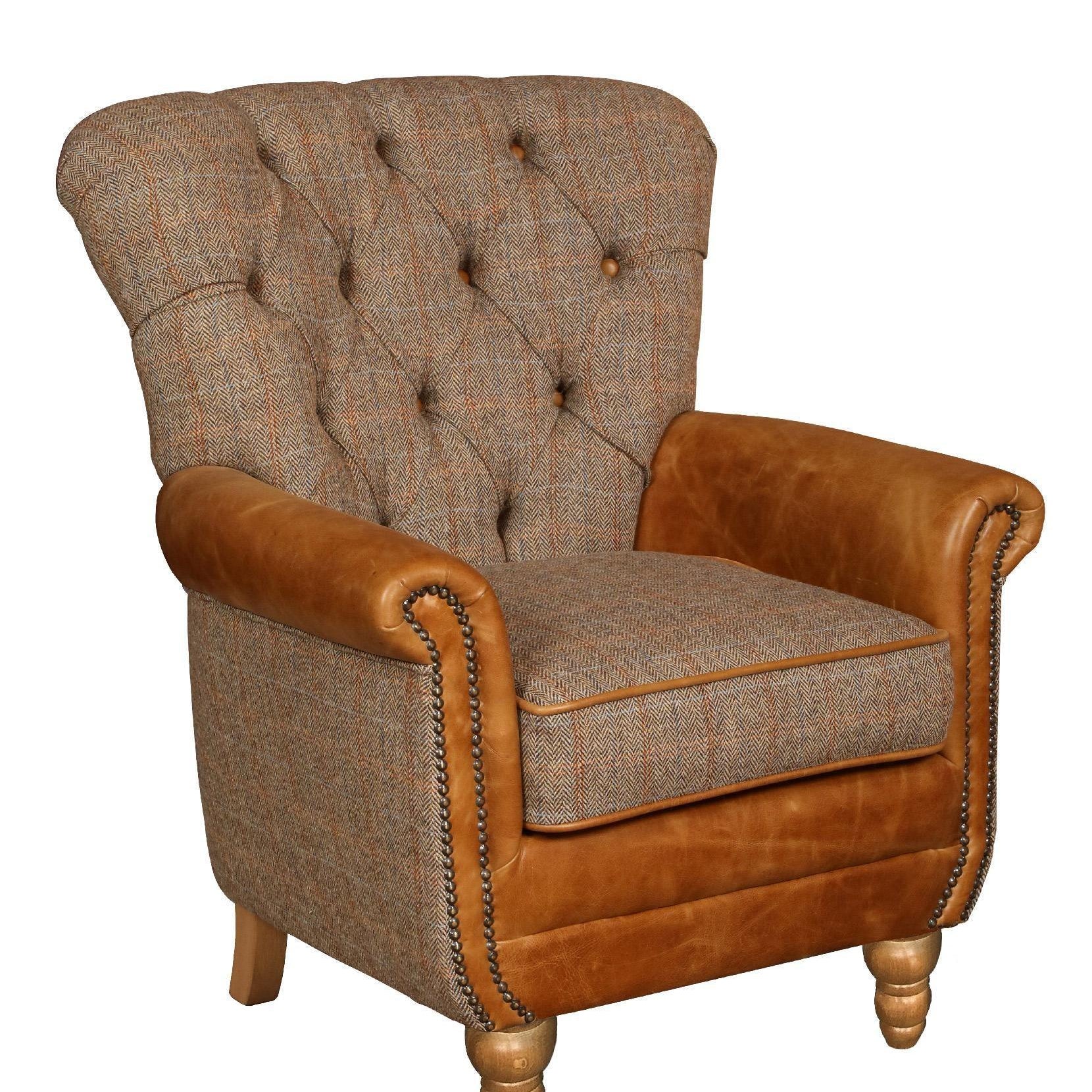 Brown fabric and leather armchair with button-tufted back and wooden legs