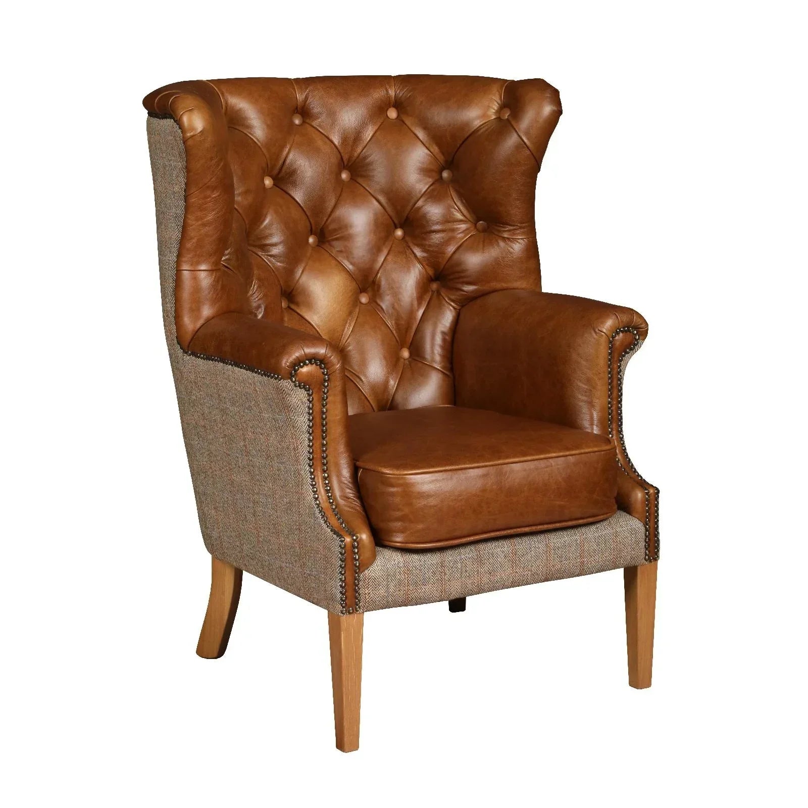 Brown leather tufted armchair with fabric sides and wooden legs, front angle view