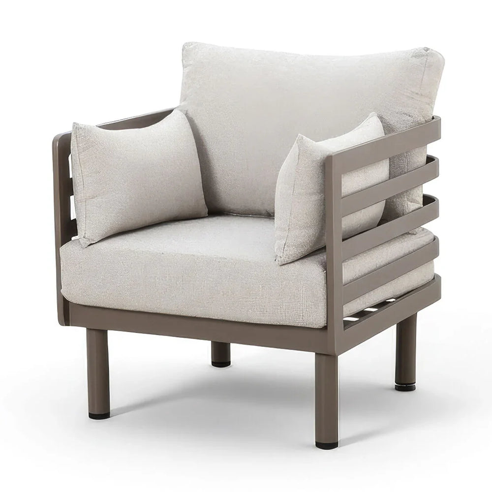 Grey cushioned armchair with metal frame and side slats, corner view