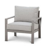 Grey fabric armchair with metal frame and thick cushions, front angle view