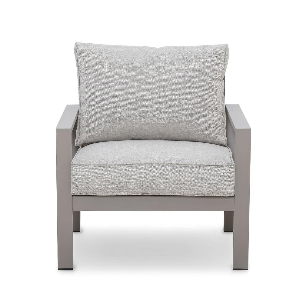 Grey fabric armchair with metal frame and thick seat and back cushions, front view
