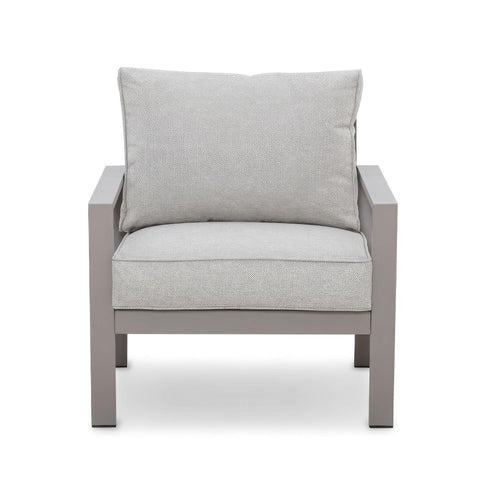Grey fabric armchair with metal frame and thick seat and back cushions, front view