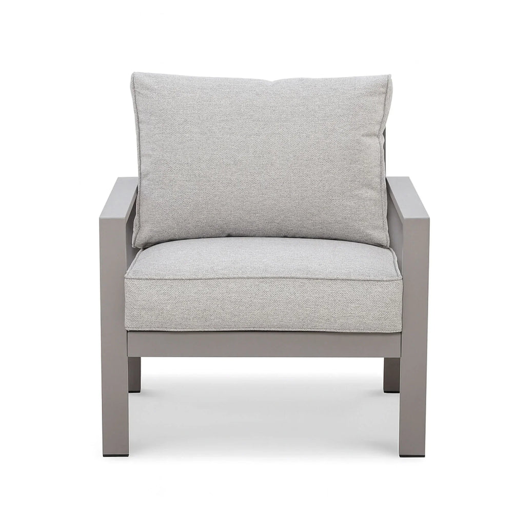 Modern grey armchair with metal frame and light grey cushions, front view