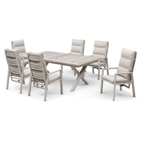 Modern dining table set with six cushioned chairs and light wood finish on white background