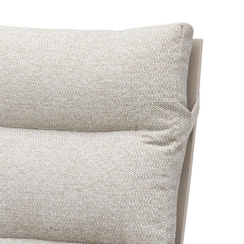 Close-up of beige fabric sofa cushion with textured upholstery