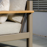 Beige outdoor sofa corner with metal frame, wooden armrest and cream fabric cushions