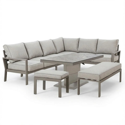 Grey corner garden sofa set with cushions, rectangular dining table, bench and stool