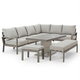 Grey corner garden sofa set with cushions, rectangular dining table, bench and stool