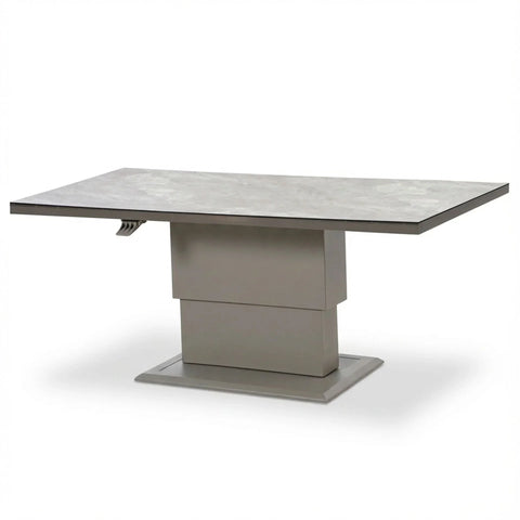 Rectangular grey ceramic dining table with pedestal base and extendable top