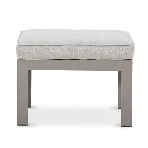 Grey fabric ottoman with cushion and sturdy square metal frame, front view